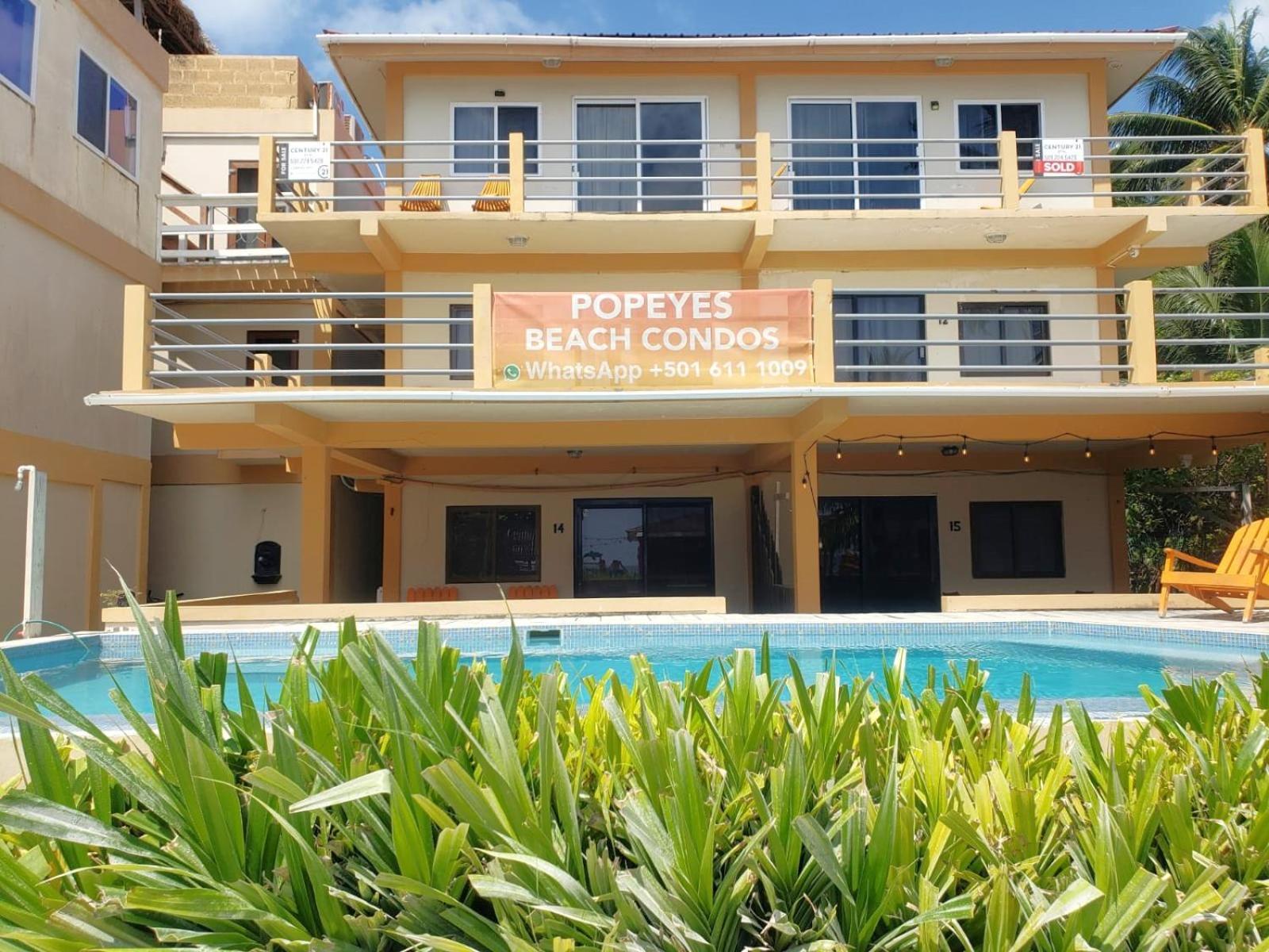 Beach Club Budget Rooms At Popeyes Caye Caulker Exterior photo